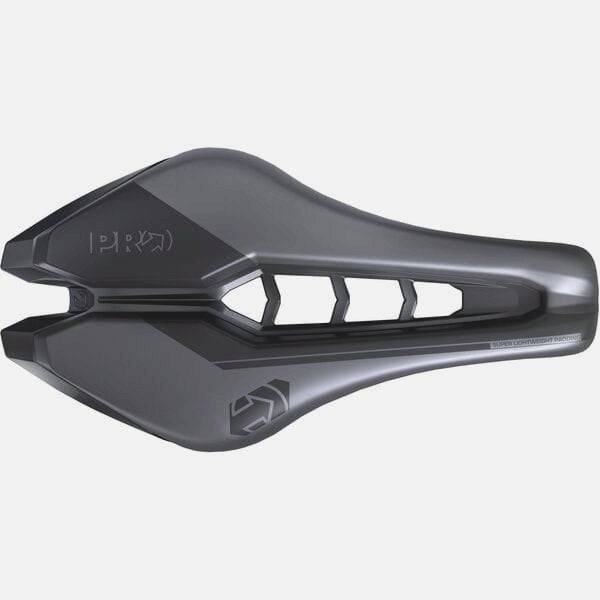 PRO TSA 1.1 Carbon rail triathlon and time trial saddle, 132mm wide, aerodynamic design, mounted on a bicycle seat post.
