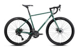 Genesis Croix de Fer 20 725 gravel bike with Shimano 2x10-speed drivetrain and TRP Spyre brakes, shown from side view.