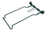 Topeak Uni Rack spring clamp securing cargo on a workshop bike rack, compatible with most uni racks for reliable hold.