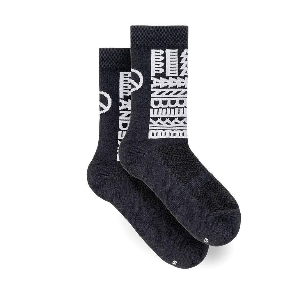 Unisex Cinelli Peace cycling socks made in Italy, featuring vibrant design and breathable fabric, for performance cycling comfort.