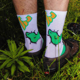 Cinelli Cactus White cycling socks featuring a unique graphic design, made for comfortable Italian cycling apparel.