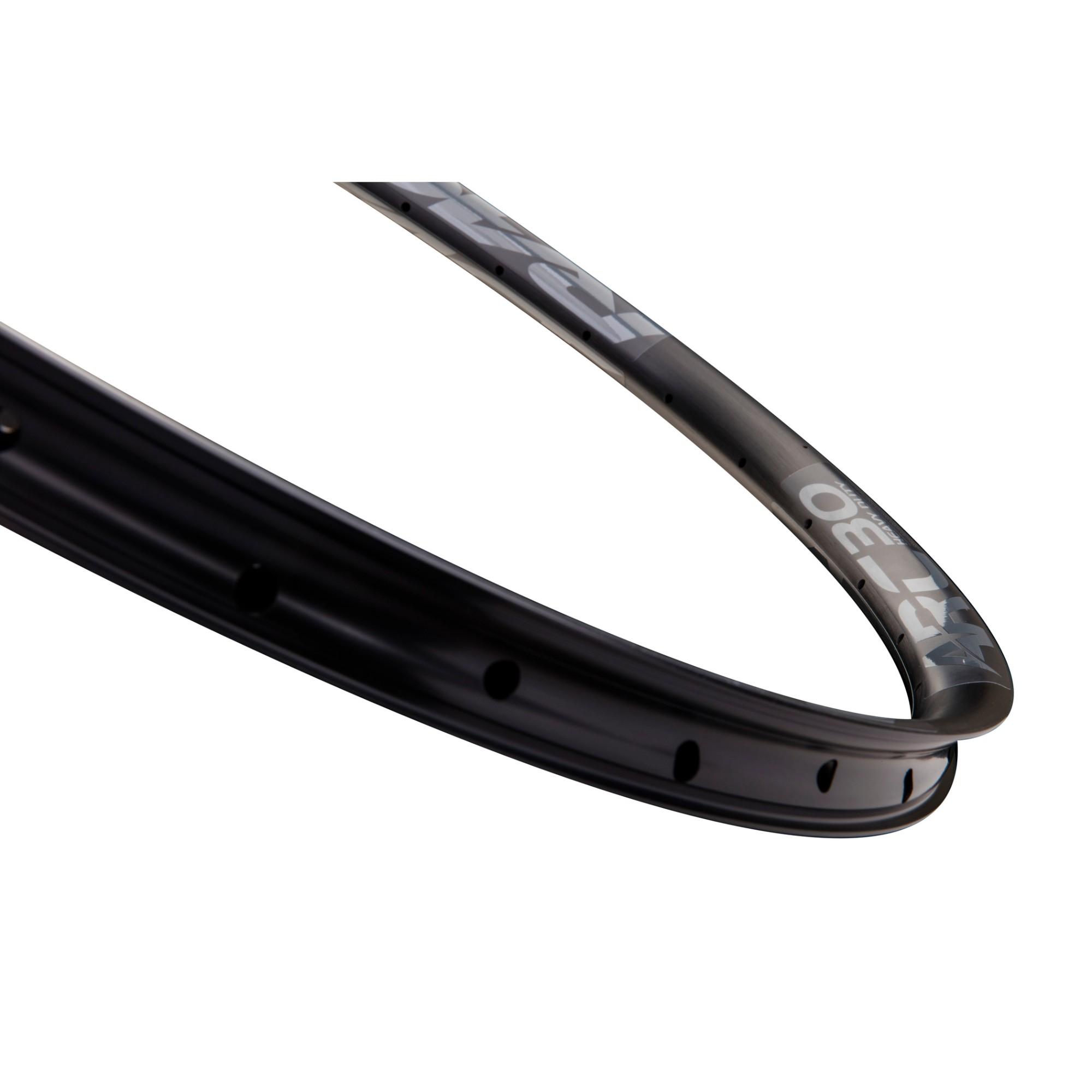 Race Face Arc mountain bike rim, tubeless-ready, 27.5 and 29-inch, heavy-duty alloy MTB wheel component with black finish.