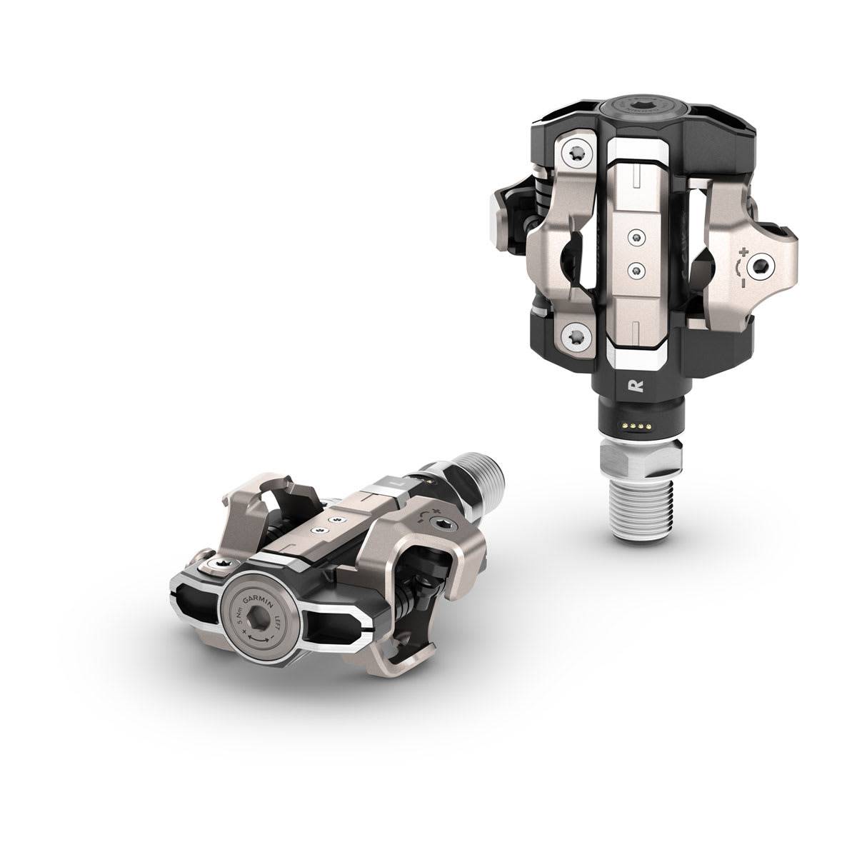 Garmin Rally XC110 single-sensing power meter pedals with Shimano SPD compatibility, shown mounted on a bicycle pedal.