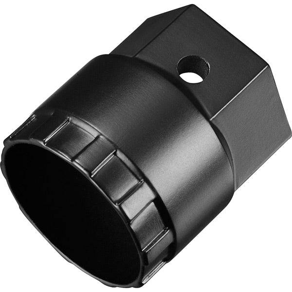 Shimano TL-LR11 lock ring removal tool for bike maintenance, shown in a workshop setting used for bike wheel repairs.