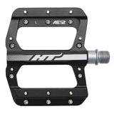 HT Components AE-12 Junior BMX flat pedal with 10 pins for enhanced grip, showing the black BMX pedal with textured surface.