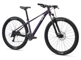 Liv Tempt 3 women's mountain bike with ALUXX frame and Shimano Acera 1x drivetrain, featuring knobby tires and a sleek black frame.