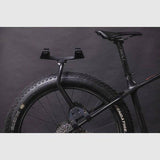 Aeroe Spider Fat Rack accessory for fat bikes and e-bikes, featuring a modular cradle system for secure bike transport.