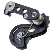 Rohloff Speedhub fat tire bike chain tensioner component, close-up of spare part for bicycle drivetrain maintenance.