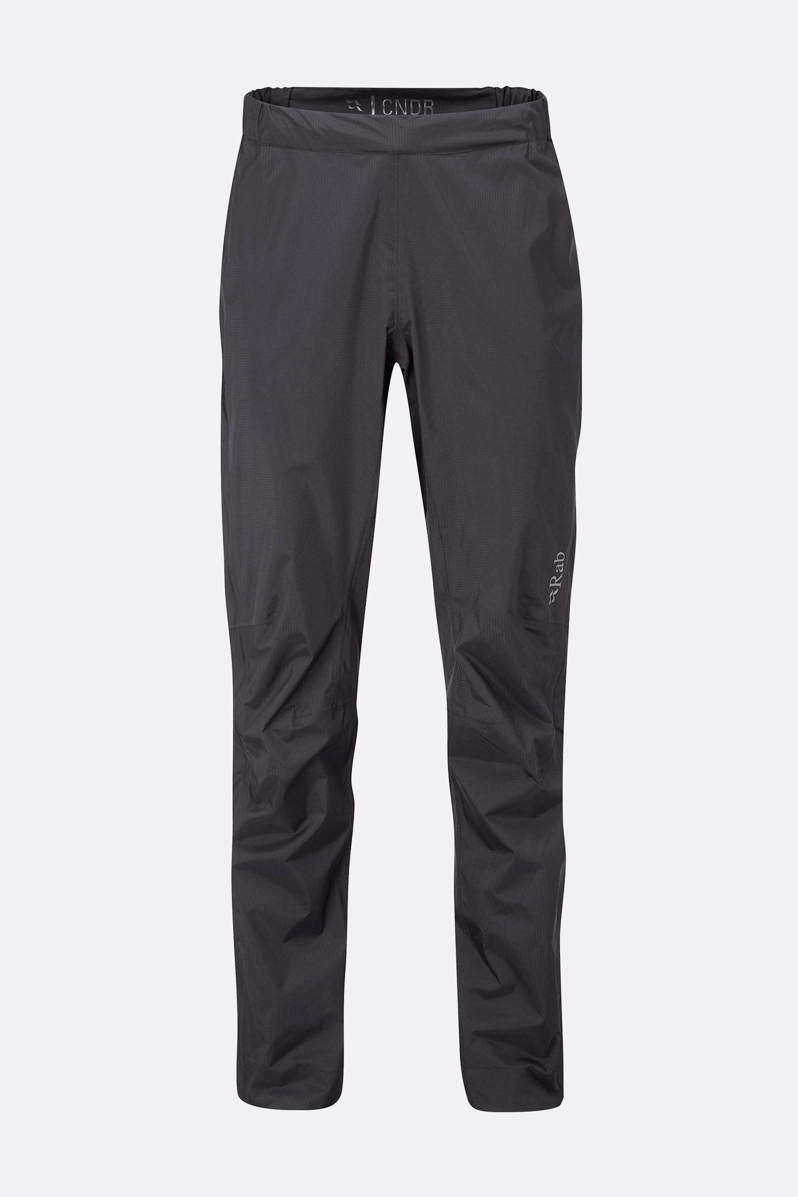 Rab Cinder Downpour Light waterproof cycling pants in anthracite with articulated knees and side zips, designed for outdoor cycling.