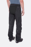 Rab Cinder Downpour Light waterproof cycling pants in anthracite with articulated knees and side zips, shown from the back.
