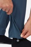 Rab Cinder Kinetic long outdoor pants in Orion Blue with adjustable waistband, showcasing durable performance outdoor clothing.