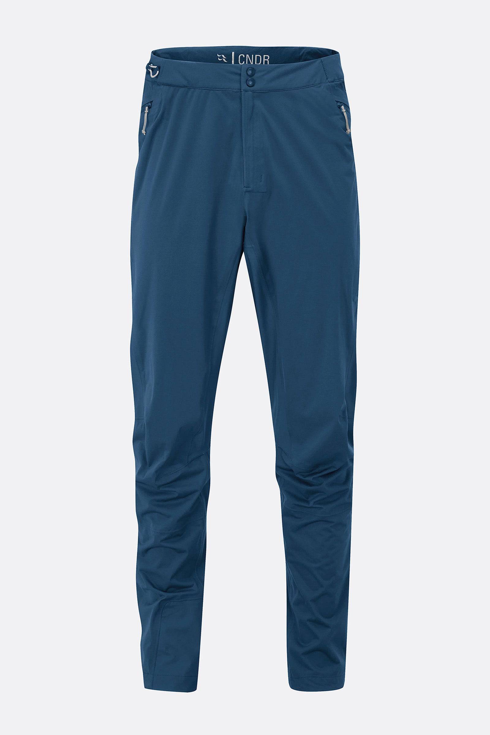 Rab Cinder Kinetic long pants in tempest blue, durable outdoor trousers with adjustable waistband and reinforced knees.