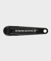 Black Race Face Ride crank arms for XC and trail bikes, CNC machined components for durable mountain biking performance.