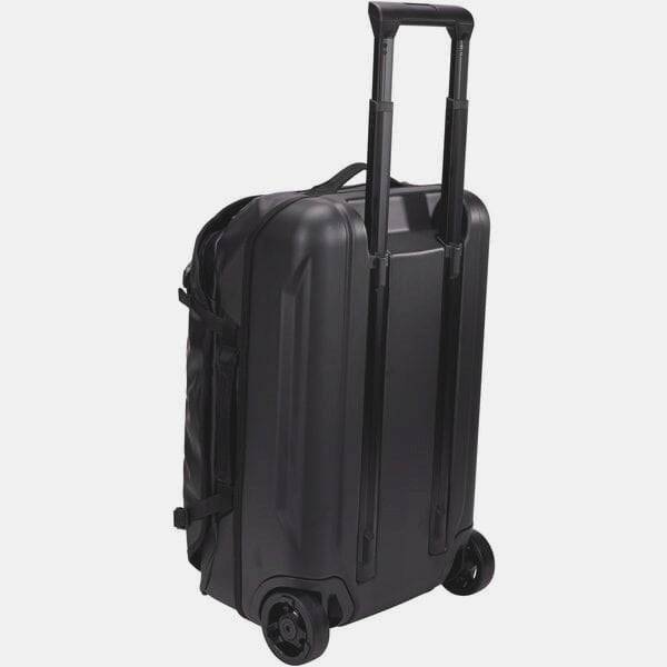 Black Thule Chasm Carry On wheeled suitcase with durable construction and oversized wheels for easy travel.