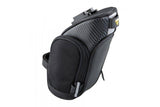 Topeak Mondopack Compact Seat Pack in black with QuickClick mounting and reflective strip attached to bike saddle.