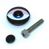 Vibrant Cinelli bike headset top cap with durable design, fits steering components and adds a colorful touch to bike handlebars.