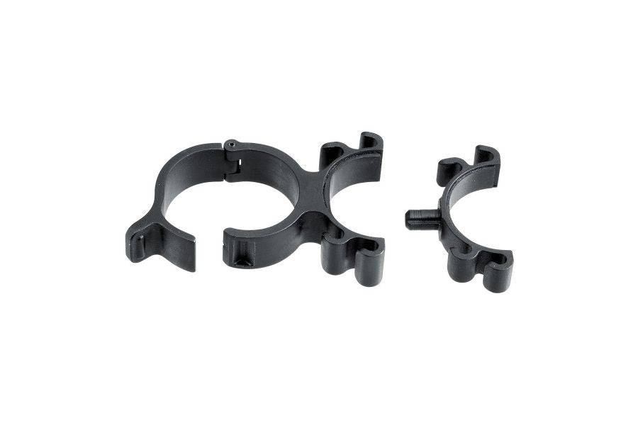 Topeak Mini Rocket Iglow bike pump bracket mounted on a bicycle frame for secure accessory storage.