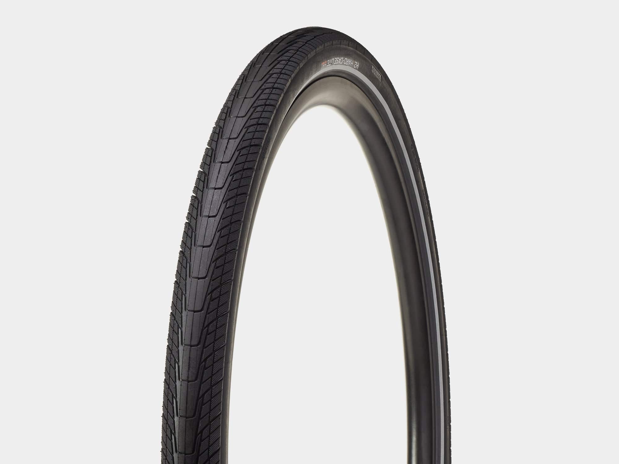 Bontrager H2 Hard-Case Lite bicycle tyre with puncture protection and reflective sidewalls, shown mounted on a bike wheel