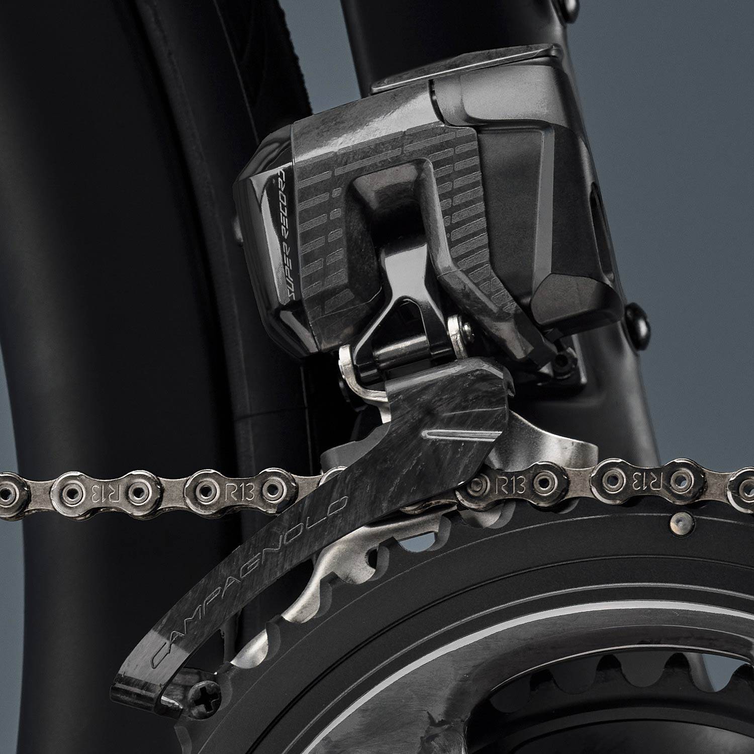 Campagnolo Super Record 13x wireless front derailleur, precision electronic shifting component, shown with mounting and cable connections.