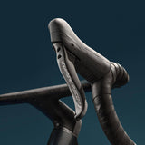 Campagnolo Super Record 13x Wireless Ergos road bike groupset with Bluetooth shifting, featuring ergonomic brake levers and gear controls.