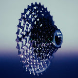 Campagnolo Super Record Ultra 13-speed cycling drivetrain components, including crankset, chain, and derailleur, on a white background.