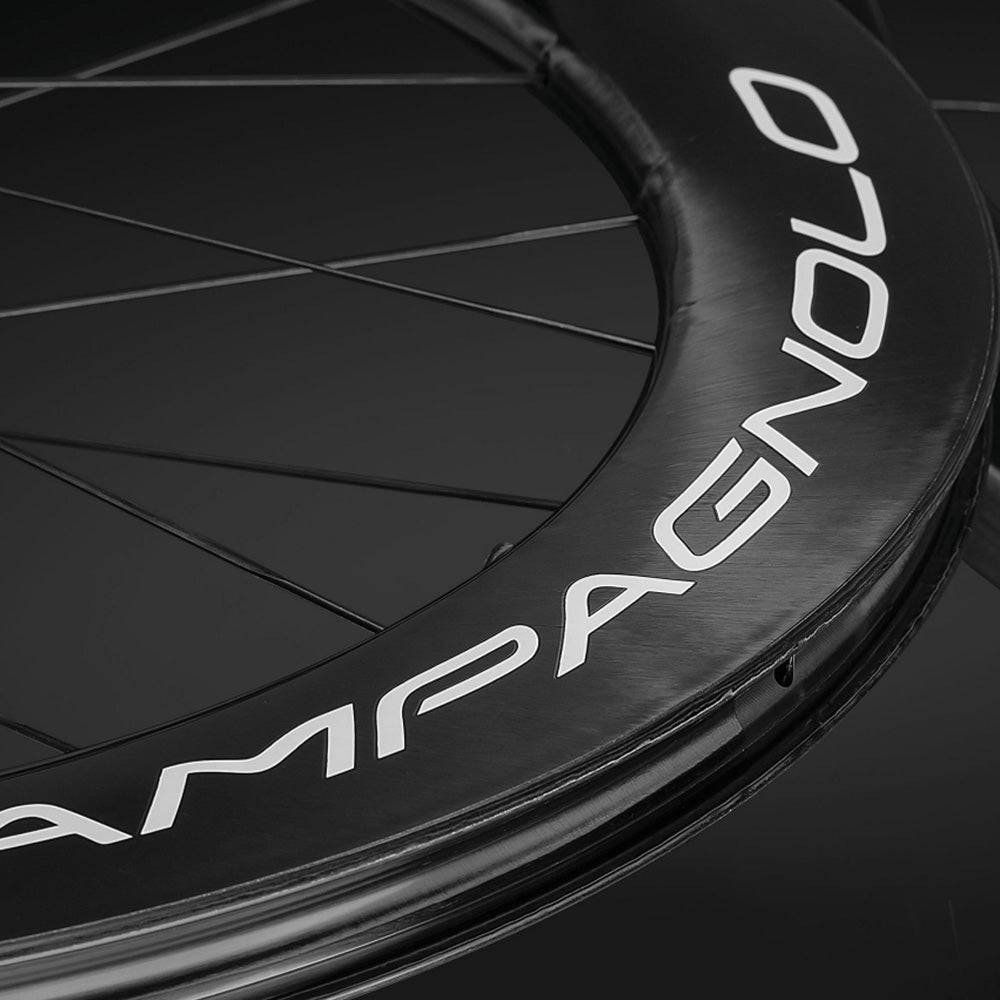 Campagnolo Pista 65 Carbon Track Wheel with 2-Way Fit and CULT Ceramic Bearings, shown on a bike wheel rim.