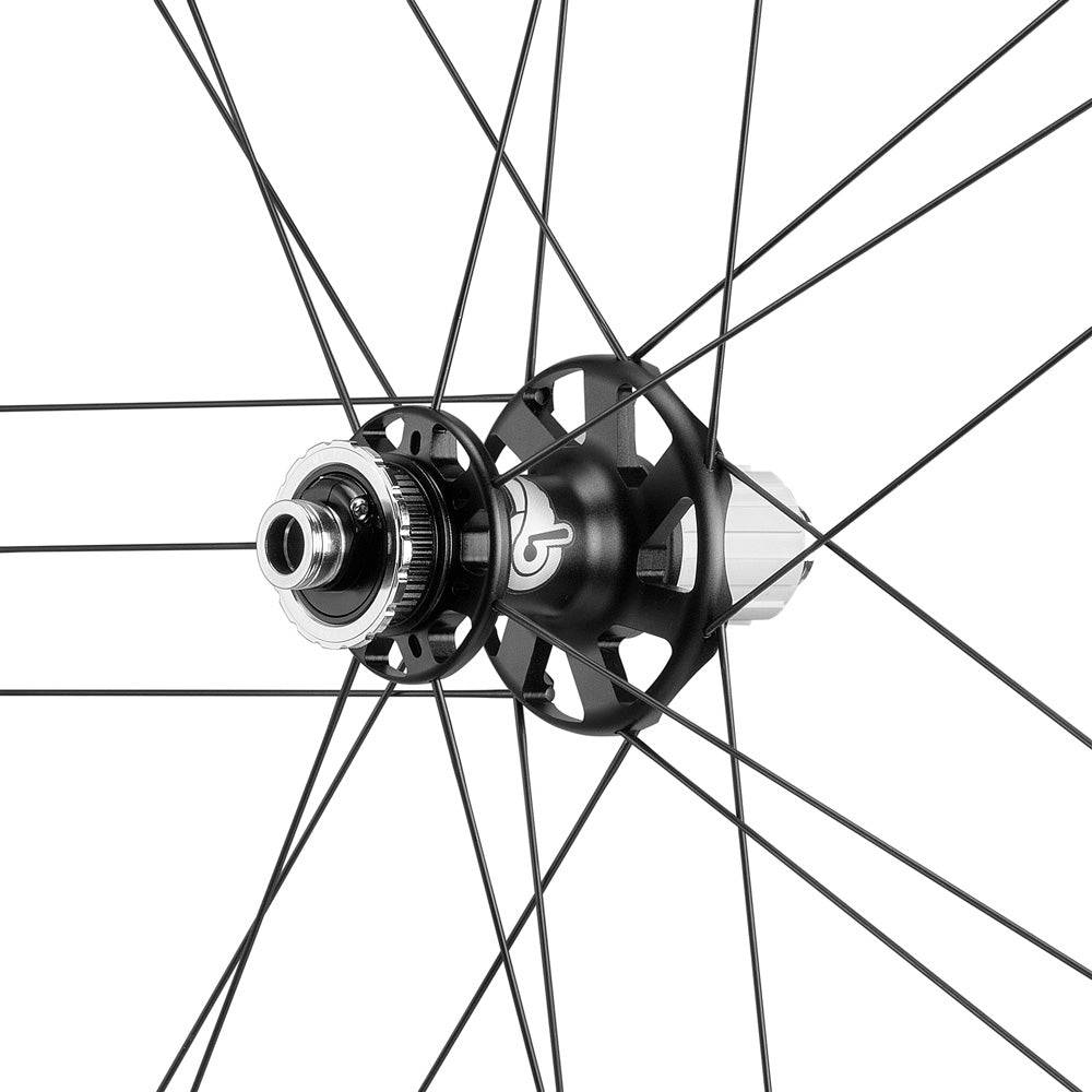 Campagnolo Scirocco DB Cl BT12 AFS road wheel with 33mm tubeless-ready rim, showing the sleek, aerodynamic design and braking surface.