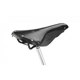 Brooks B17 Leather Bike Saddle with black steel rails, designed for long-distance cycling comfort.