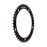Genetic CNC machined tibia track chainring for road bikes, 1/2 x 1/8 inch, with a sleek metallic finish and detailed teeth.