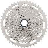 Shimano Deore 10-speed MTB cassette with 11-46T Hyperglide sprockets, bike component for mountain biking.