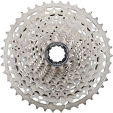 Shimano Deore CS-M5100 11-speed MTB cassette with Hyperglide sprockets for smooth shifting on mountain bikes.