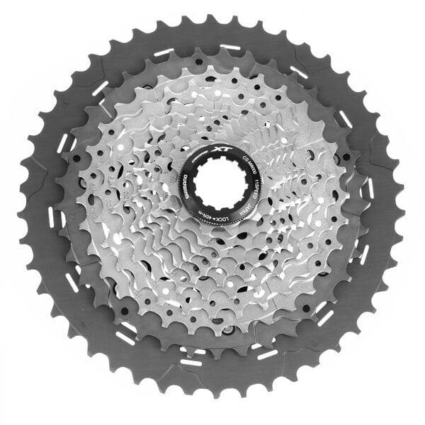 Shimano Deore XT CS-M8000 11-speed MTB cassette with Hyperglide for smooth shifting, shown with gear teeth and black finish.