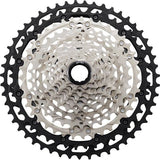 Shimano Deore XT CS-M8100 12-speed MTB cassette with 10-45T Hyperglide micro spline, showing the gear cogs and branding.