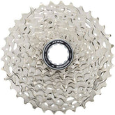 Shimano 105 CS-R7101 12-speed bicycle cassette with 11-34T gears and Hyperglide+ technology, mounted on a bike wheel.