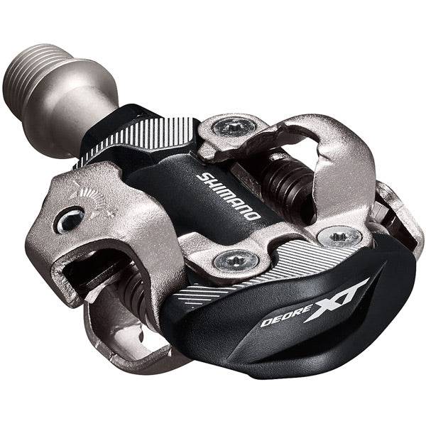 Shimano Deore XT PD-M8100 XC Race SPD pedals with adjustable tension and mud shedding for mountain biking.