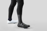 Shimano Unisex Dual Fit rain shoe cover with SplashShield technology for cycling, shown on a shoe with reflective detailing.