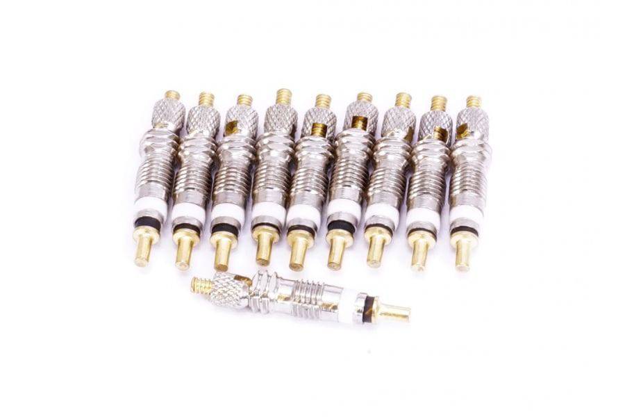 Set of 10 Orange Seal silver valve cores for tubeless valve kits, replacement components for bike or tire maintenance.