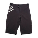 Race Face Sendy Youth Mountain Bike Shorts with adjustable waist and zippered pockets, designed for active riding comfort.