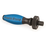 Park Tool DP-2 threaded dummy pedal used for bike maintenance and gear tuning, shown mounted on a bike crank in a workshop setting.