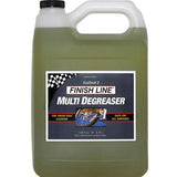 Finish Line EcoTech 2 biodegradable bike degreaser in a workshop setting, showing the eco-friendly cleaner bottle with labels.