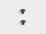 Pair of black Bontrager Pro Blendr Adapter Puck Bolts M3 x 4mm for computer mount accessories, shown in close-up.
