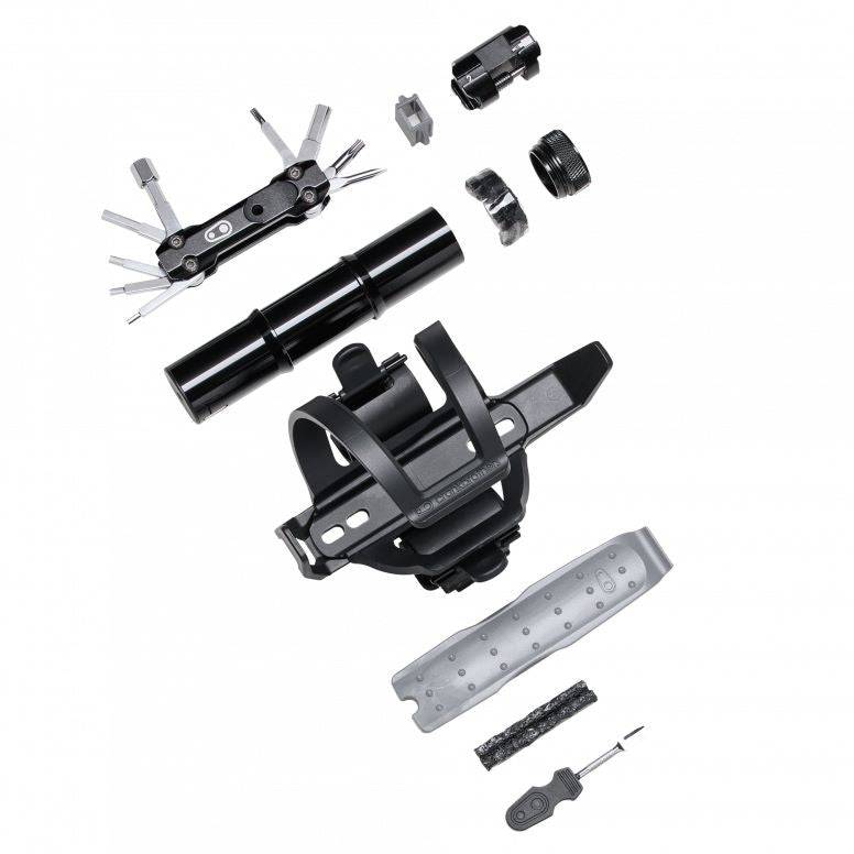 Crankbrothers BC18 SOS Bottle Cage Tool Kit with multi-tool in black and silver, designed for bike workshop use.