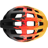 Lazer J2 kids mountain bike helmet with TS+ retention system and ventilation, shown in a natural outdoor setting.