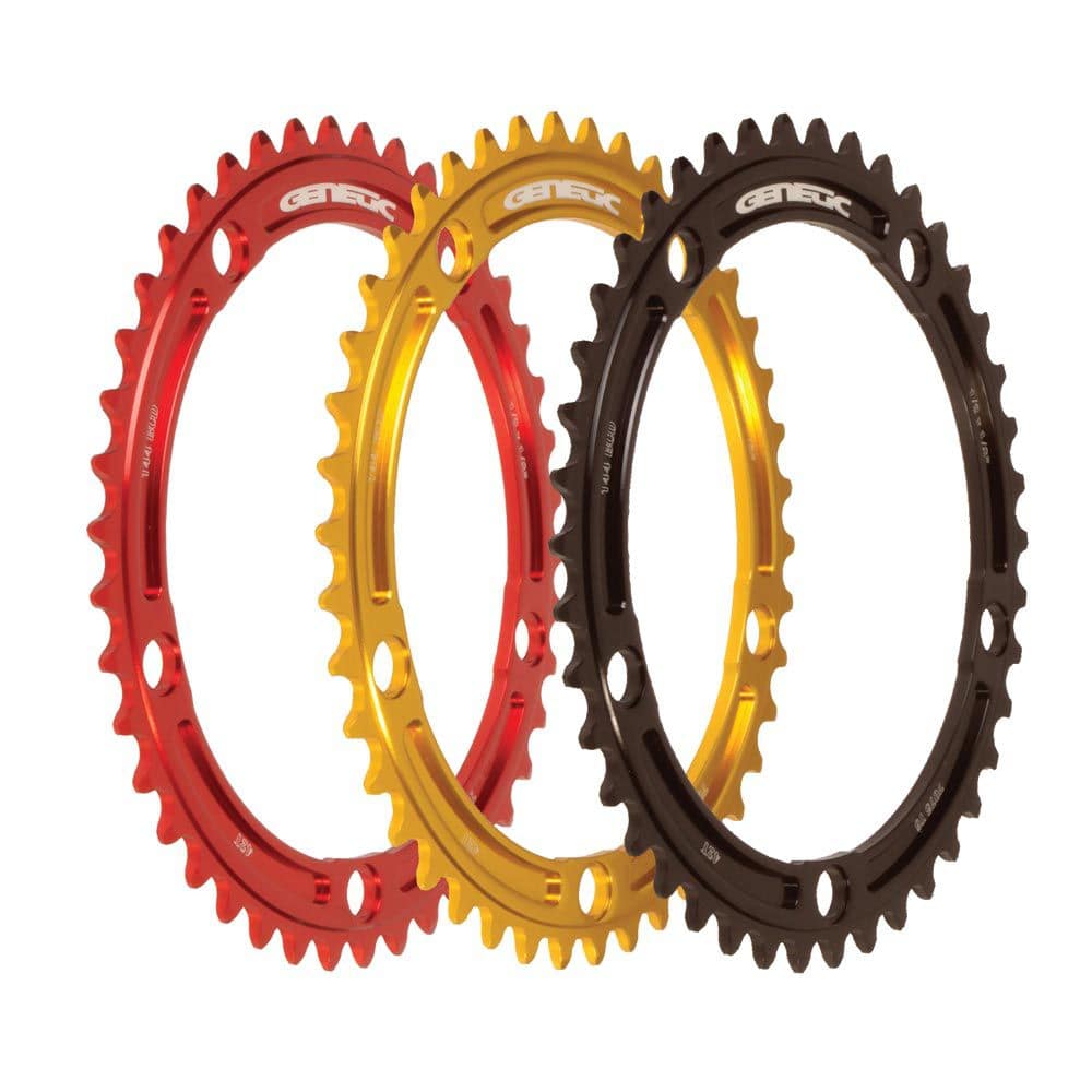 Genetic CNC machined chainring for road bikes, 1/2 x 1/8 inch tibia track chainring component with intricate metal detailing.