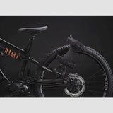 Aeroe Spider rear bike rack with cradle mount system for bikes and e-bikes, shown installed on a bicycle.