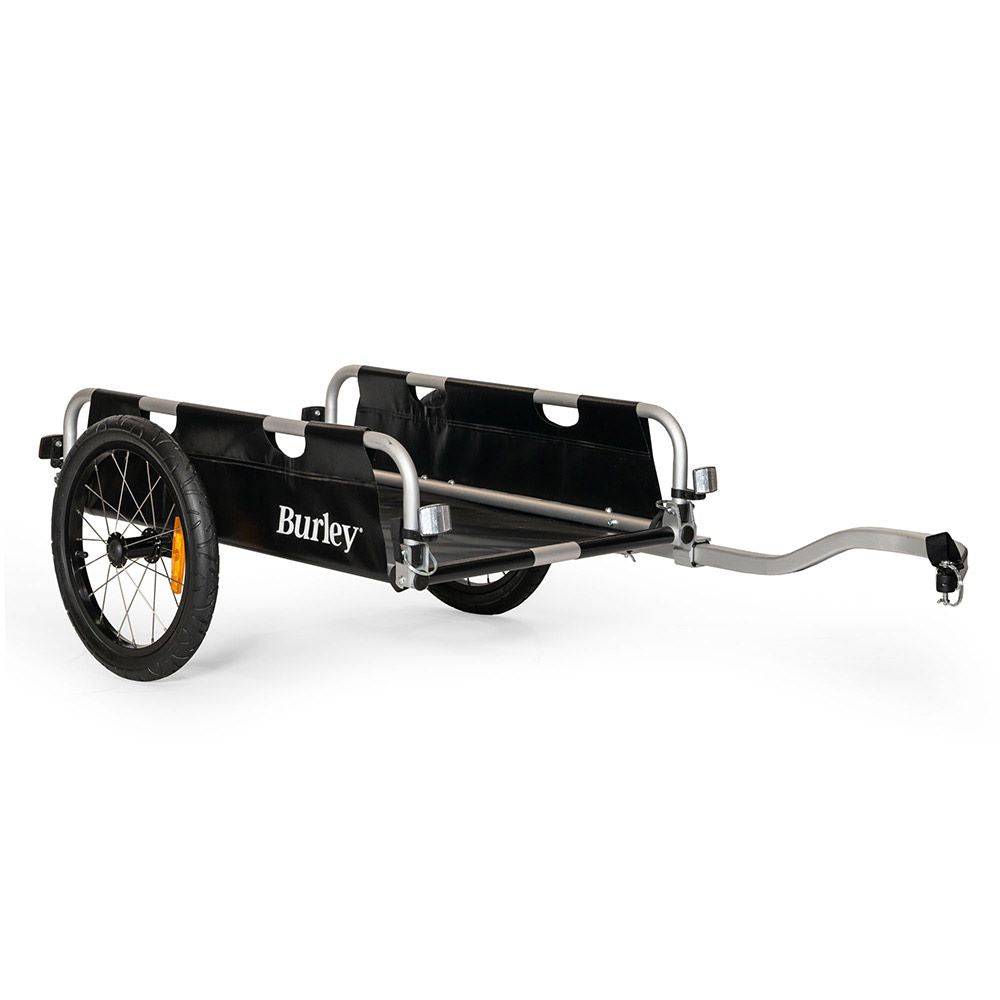 Burley foldable two-wheel cargo bike trailer with flatbed for hauling bulk items, shown attached to a bicycle.