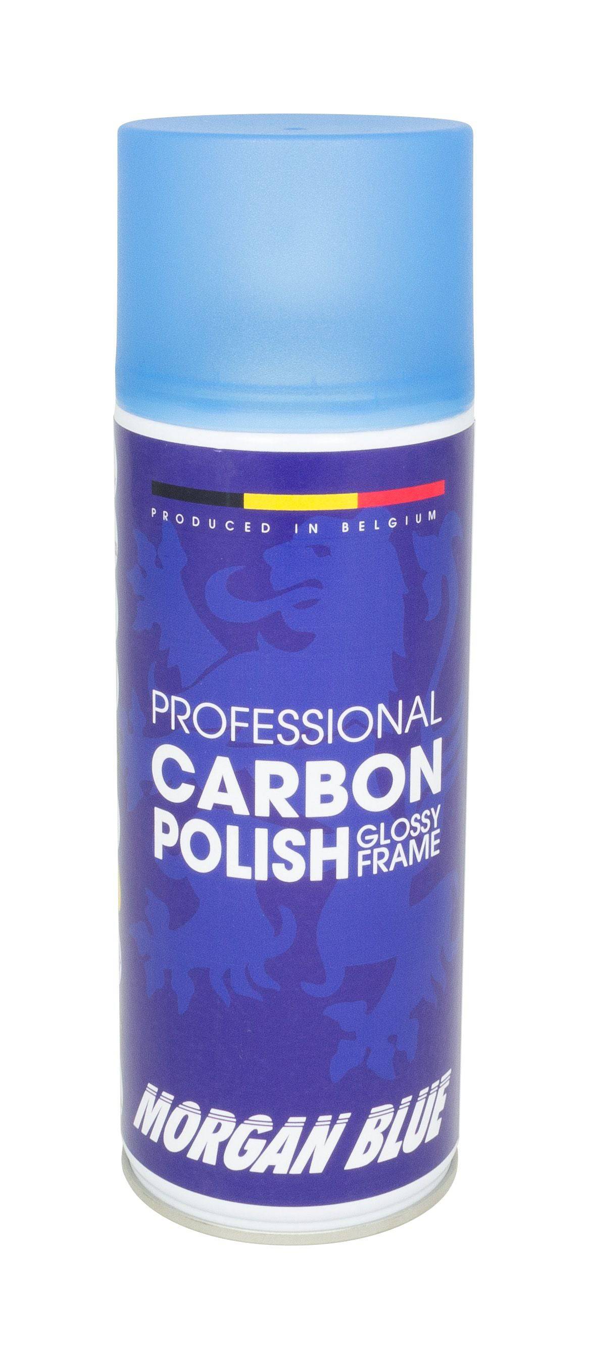 Morgan Blue Carbon Polish aerosol spray for bike paint and chrome cleaning with protective shine, shown in a workshop setting.
