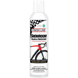 Finish Line Showroom Polish Ceramic Tech aerosol bike cleaner and protector in a workshop setting, packaged in a box of six.
