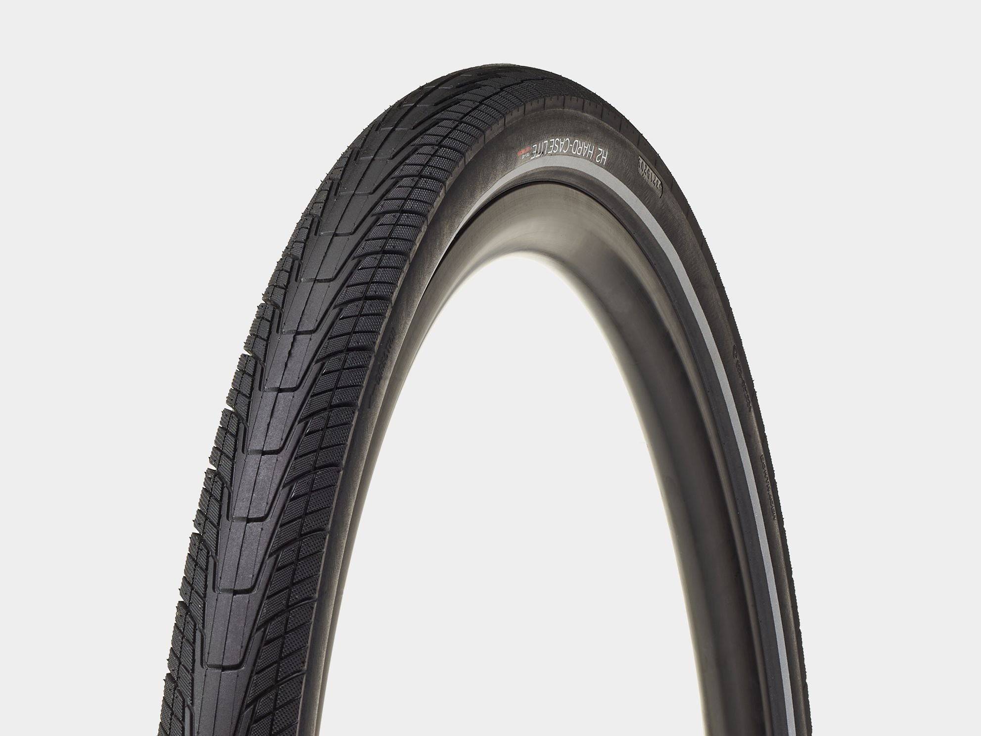 Bontrager H2 Hard-Case Lite tire with puncture protection and reflective sidewalls, mounted on a bicycle wheel.