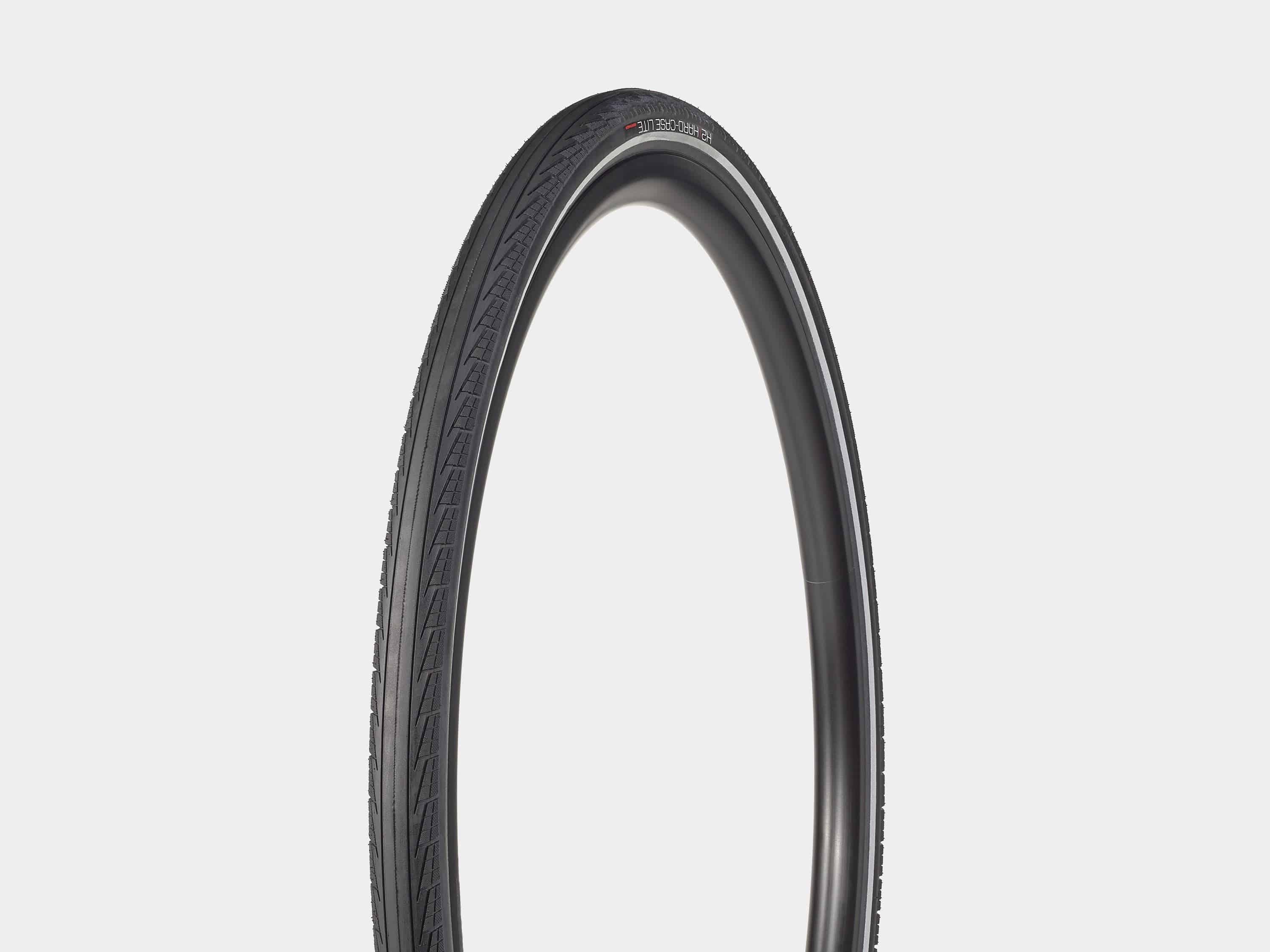 Bontrager H2 Hard-Case Lite reflective hybrid bike tires showing tread pattern and sidewall details for durability and puncture resistance.